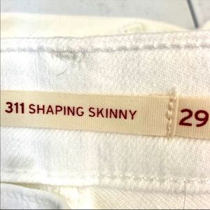 Levi’s 314 shaping straight leg white jeans